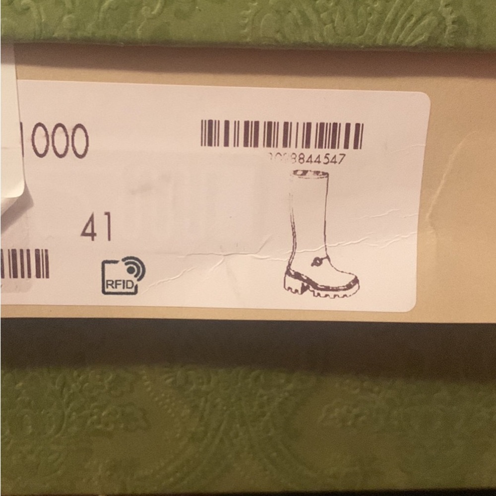 Knee high Gucci rain boots